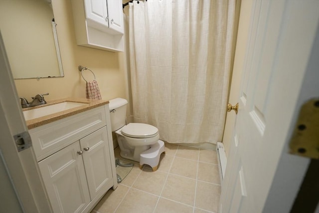 full bathroom featuring toilet, tile patterned flooring, vanity, and a shower with curtain