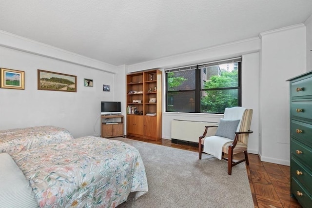 2 Hawthorne Pl Unit 2E & 2F, Boston, MA 02114 - bedroom featuring radiator heating unit and crown molding