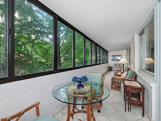 2 Hawthorne Pl Unit 2E & 2F, Boston, MA 02114 - sunroom featuring tile patterned floors and plenty of natural light