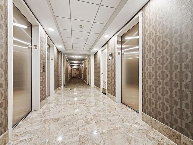 2 Hawthorne Pl Unit 2E & 2F, Boston, MA 02114 - hall featuring elevator and recessed lighting