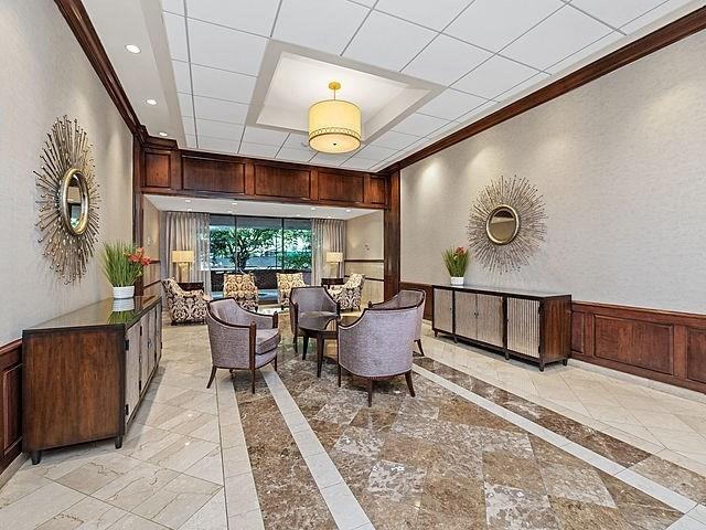 2 Hawthorne Pl Unit 2E & 2F, Boston, MA 02114 - building lobby with wainscoting and crown molding