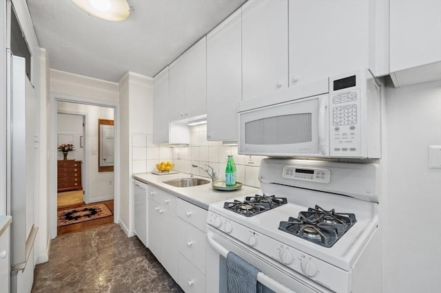 2 Hawthorne Pl Unit 2E & 2F, Boston, MA 02114 - kitchen with white appliances, a sink, light countertops, and white cabinets