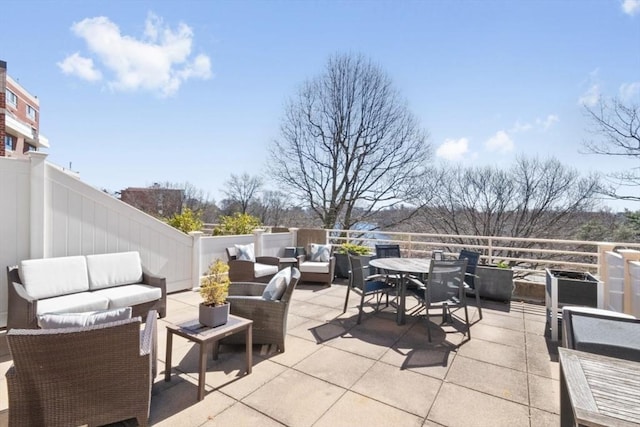 view of patio featuring outdoor lounge area and outdoor dining space