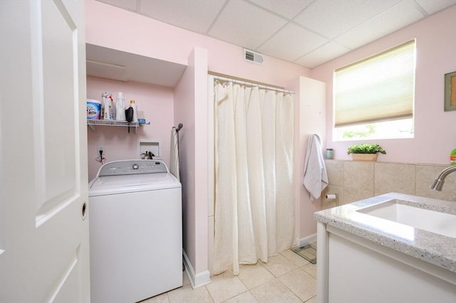 89 Block St, Abington, MA 02351 - laundry room featuring washer / dryer and light tile patterned floors