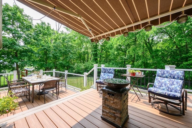 89 Block St, Abington, MA 02351 - wooden terrace featuring outdoor dining space and view of wooded area