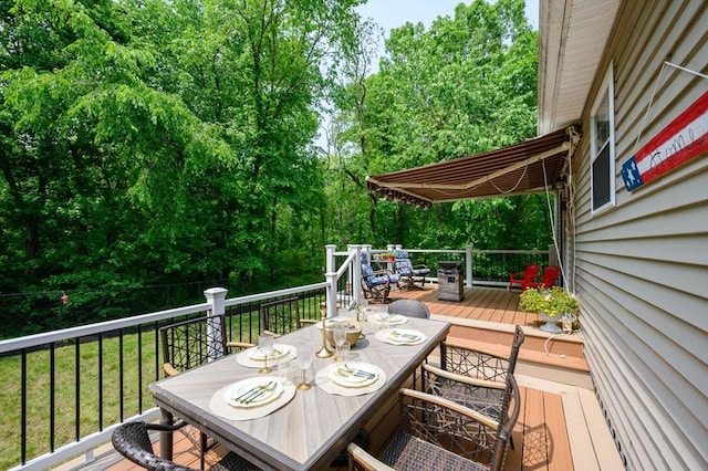 89 Block St, Abington, MA 02351 - wooden terrace with outdoor dining area and view of scattered trees