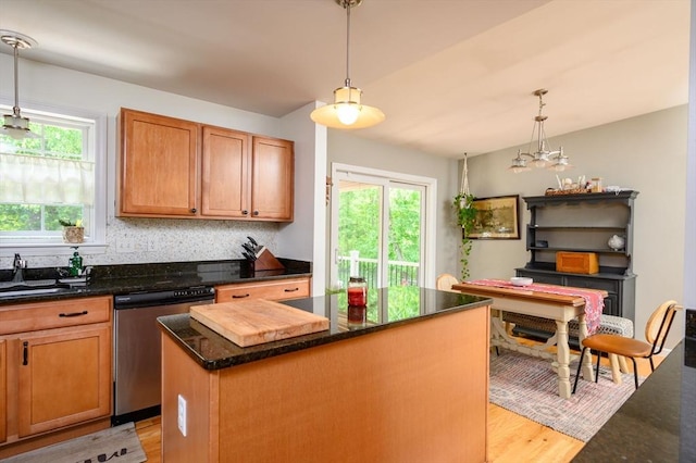 89 Block St, Abington, MA 02351 - kitchen featuring dishwasher, a kitchen island, a sink, light wood finished floors, and pendant lighting