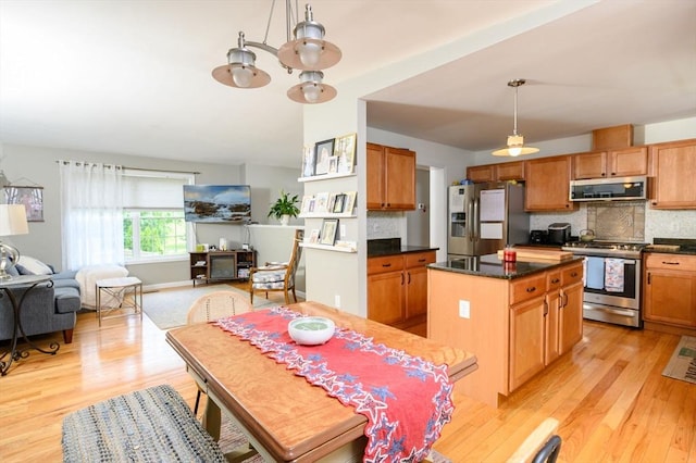 89 Block St, Abington, MA 02351 - dining room featuring light wood-style flooring