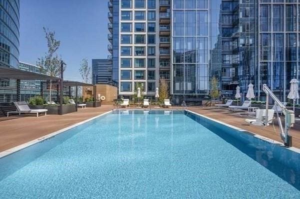 community pool featuring a patio area