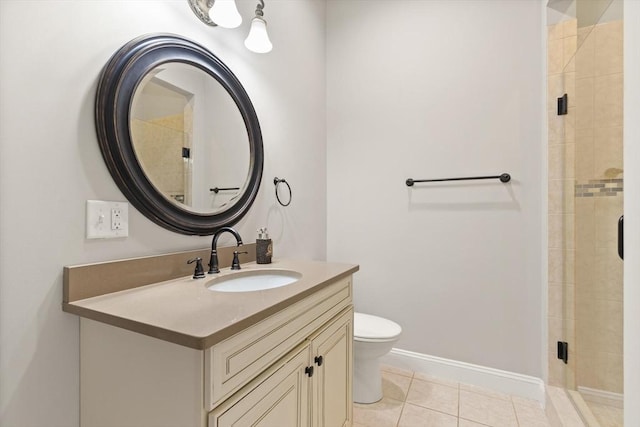 bathroom featuring toilet, tile patterned flooring, a shower with shower door, and vanity