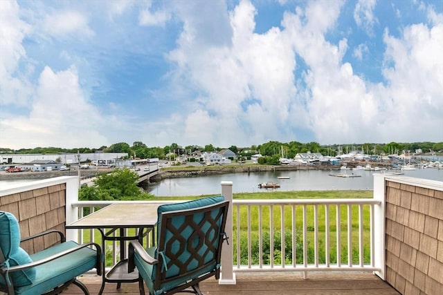 balcony featuring a water view