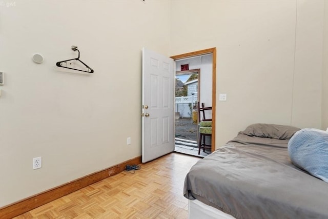bedroom featuring baseboards