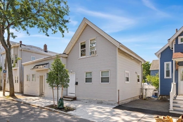 back of property with entry steps