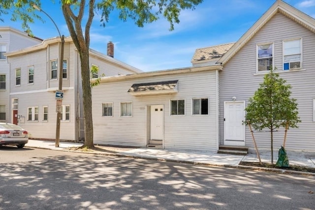 townhome / multi-family property featuring entry steps