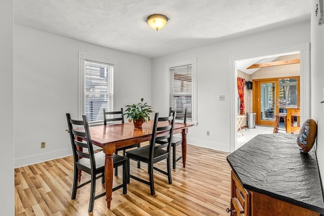 66 Guinan St, Waltham, MA 02451 - dining area featuring baseboards and light wood finished floors