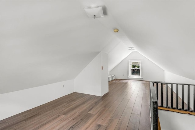 66 Guinan St, Waltham, MA 02451 - additional living space with vaulted ceiling and wood finished floors