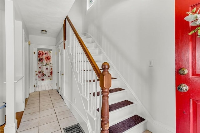 66 Guinan St, Waltham, MA 02451 - stairs with tile patterned flooring