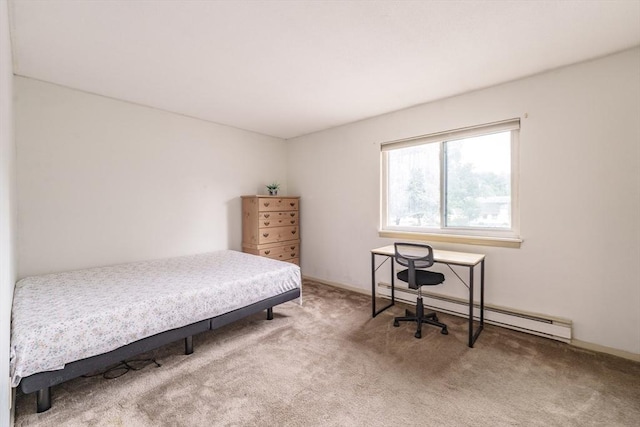170 E Hadley Rd Unit 60, Amherst, MA 01002 - bedroom with a baseboard radiator and carpet