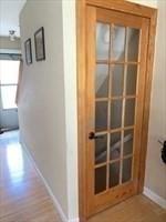 170 E Hadley Rd Unit 60, Amherst, MA 01002 - corridor with wood finished floors