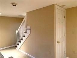 170 E Hadley Rd Unit 60, Amherst, MA 01002 - stairs featuring baseboards