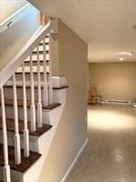 170 E Hadley Rd Unit 60, Amherst, MA 01002 - staircase with baseboards