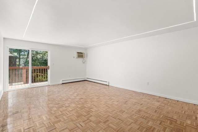 unfurnished room with baseboards, a baseboard radiator, and an AC wall unit