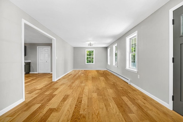 69 Biscuit Hill Dr, Leominster, MA 01453 - unfurnished room with baseboard heating and light wood finished floors