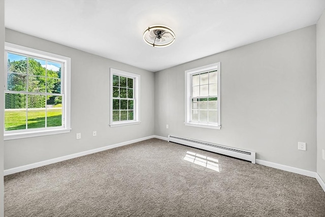 69 Biscuit Hill Dr, Leominster, MA 01453 - unfurnished room featuring a baseboard heating unit, plenty of natural light, and carpet