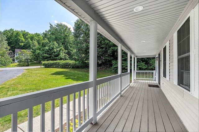 69 Biscuit Hill Dr, Leominster, MA 01453 - wooden porch featuring a lawn