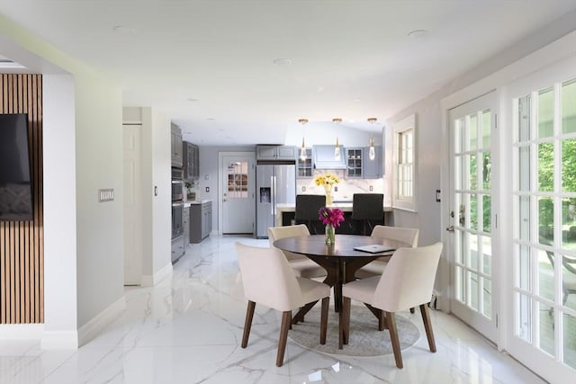 338 Highland St, Weston, MA 02493 - dining space with healthy amount of natural light, baseboards, and light marble finish floors