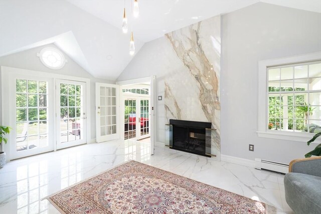 338 Highland St, Weston, MA 02493 - living room featuring baseboard heating, marble tiled flooring, lofted ceiling, a fireplace, and french doors