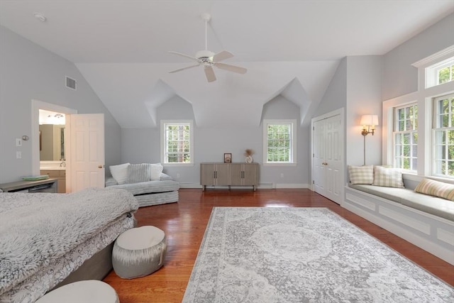 338 Highland St, Weston, MA 02493 - bedroom with wood finished floors, multiple windows, lofted ceiling, ceiling fan, and connected bathroom