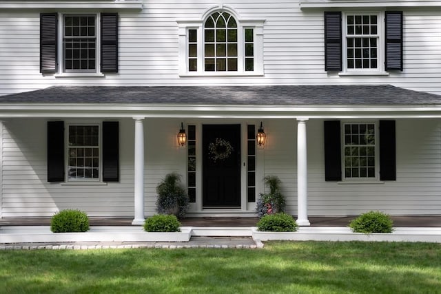 338 Highland St, Weston, MA 02493 - entrance to property featuring a porch and roof with shingles