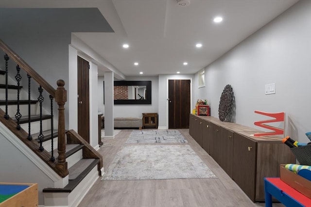 338 Highland St, Weston, MA 02493 - entrance foyer with light wood finished floors, recessed lighting, and stairway
