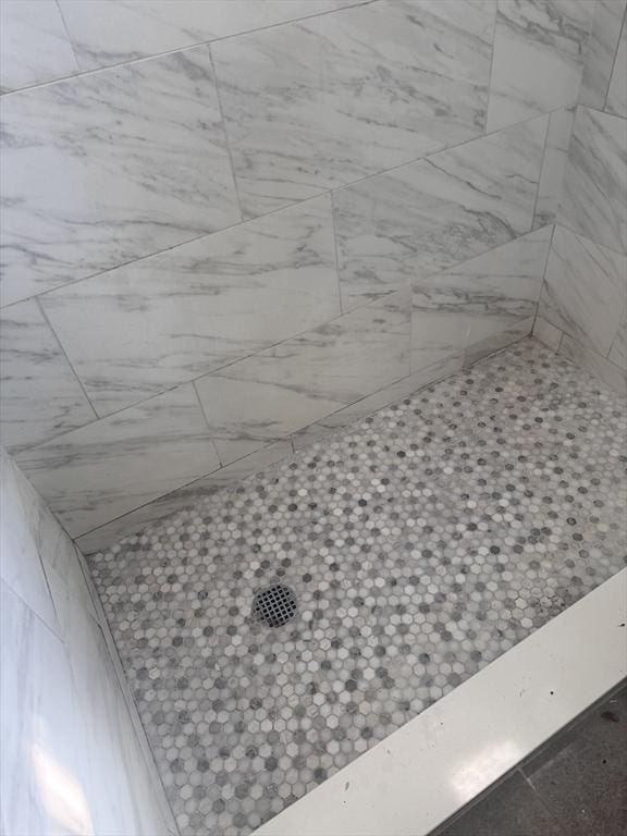 486 Revere Unit 2, Revere, MA 02151 - full bathroom featuring a tile shower