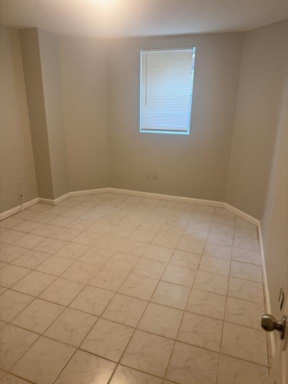 486 Revere Unit 2, Revere, MA 02151 - spare room with baseboards