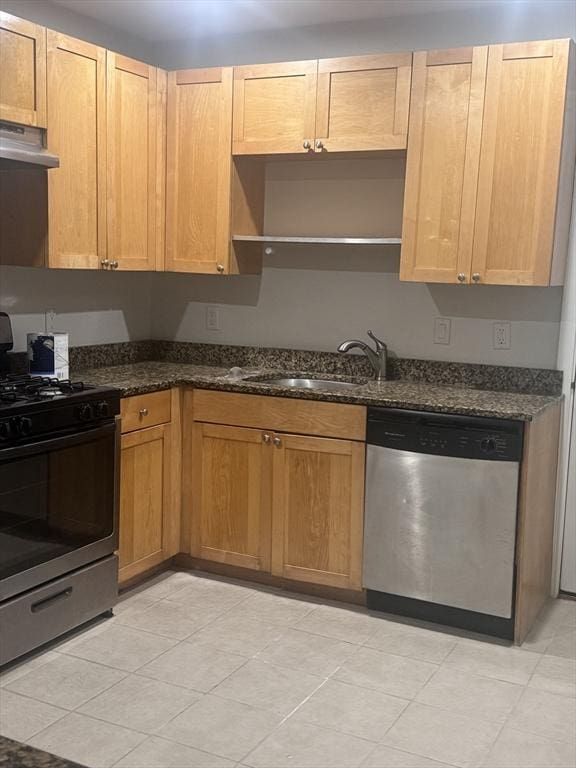 486 Revere Unit 2, Revere, MA 02151 - kitchen with stainless steel appliances, open shelves, extractor fan, and dark stone countertops