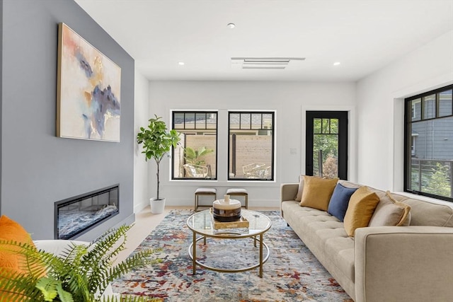 145 Warren St Unit 5, Newton, MA 02459 - living area with a glass covered fireplace and recessed lighting