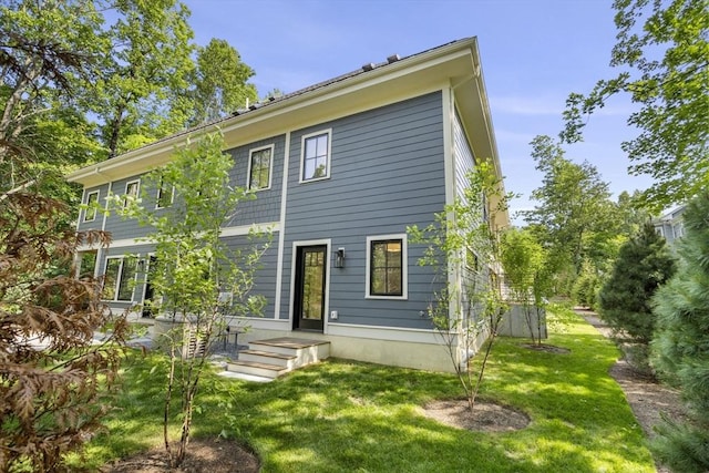 145 Warren St Unit 5, Newton, MA 02459 - rear view of property with a yard