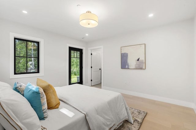 145 Warren St Unit 5, Newton, MA 02459 - bedroom with light wood finished floors and recessed lighting
