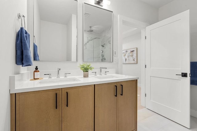 145 Warren St Unit 5, Newton, MA 02459 - bathroom featuring a marble finish shower, double vanity, and tile patterned floors