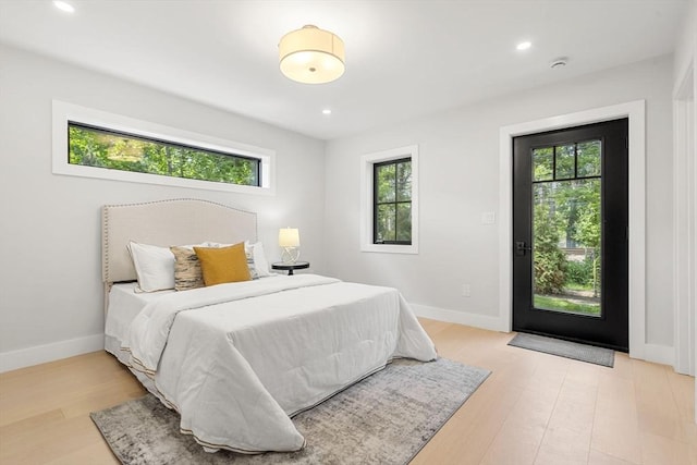 145 Warren St Unit 5, Newton, MA 02459 - bedroom with multiple windows, light wood-style floors, and recessed lighting