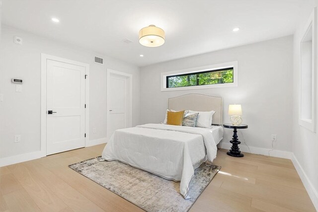 145 Warren St Unit 5, Newton, MA 02459 - bedroom featuring light wood-style floors and recessed lighting