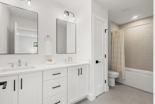 145 Warren St Unit 5, Newton, MA 02459 - bathroom with double vanity, tile patterned flooring, and shower / bath combo