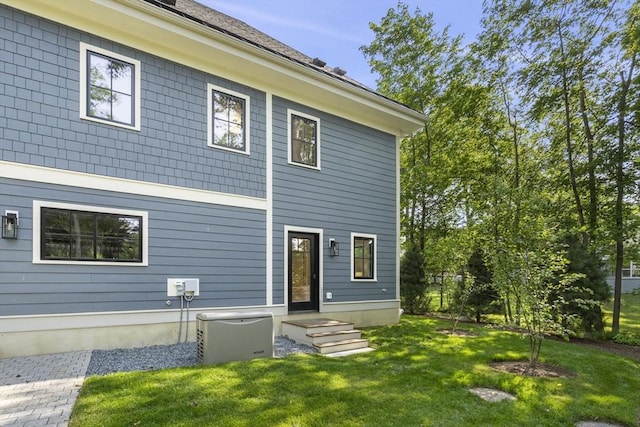 145 Warren St Unit 5, Newton, MA 02459 - back of property featuring a yard