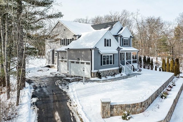 view of front of home with a garage