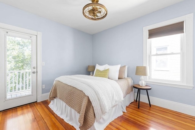 41 Sudan St Unit 3, Boston, MA 02125 - bedroom featuring access to exterior and wood finished floors