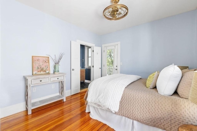 41 Sudan St Unit 3, Boston, MA 02125 - bedroom featuring light wood-type flooring and access to outside