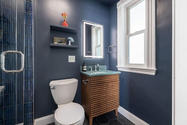 41 Sudan St Unit 3, Boston, MA 02125 - bathroom with vanity, a tile shower, and tile patterned flooring