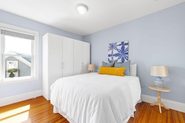 41 Sudan St Unit 3, Boston, MA 02125 - bedroom featuring wood finished floors and a closet
